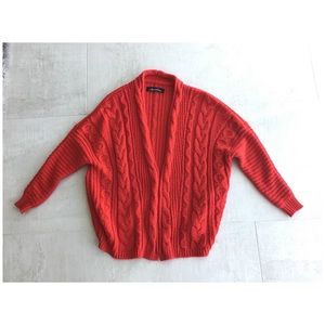 Bright red knitted sweater